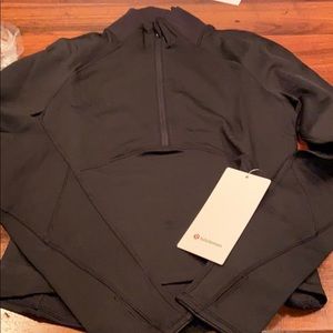 Lululemon 1/2 zip black jacket.